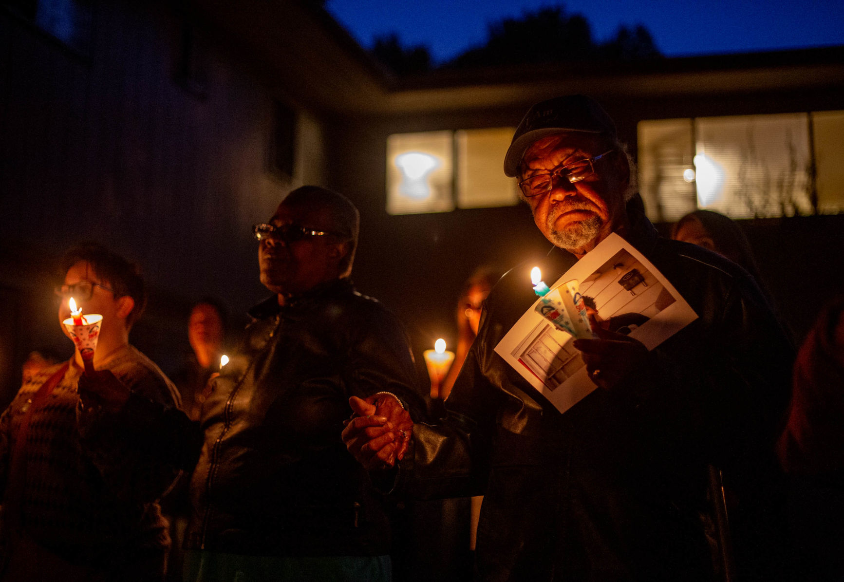 Photos: Candlelight vigil held for 16-year-old shooting victim killed Friday